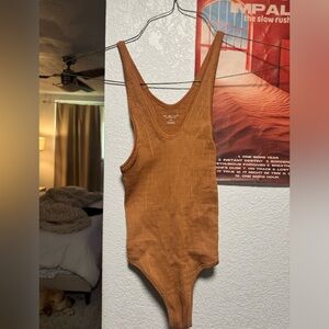 Out from under bodysuit